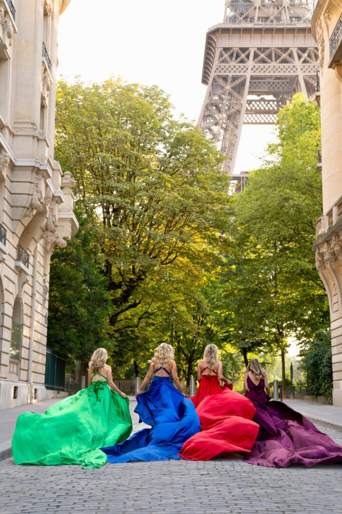 Bachelorette Photoshoot Paris walking shot in flowing dresses with Eiffel Tower in the distance