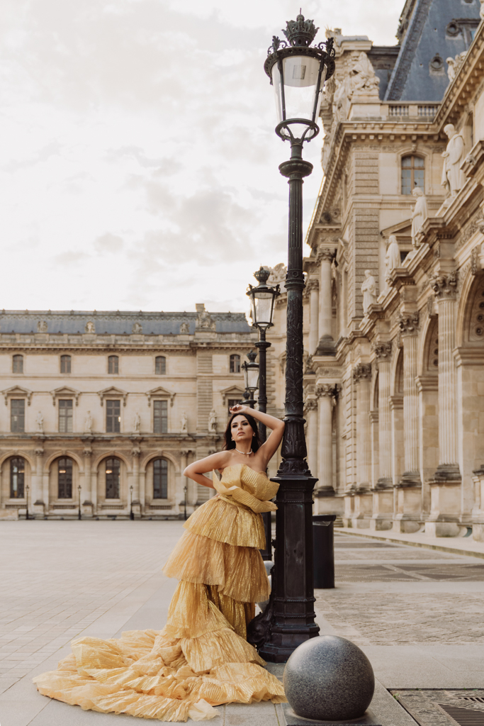 Louvre Cour Carrée Paris photoshoot location with elegant architecture and a flowing gold dress