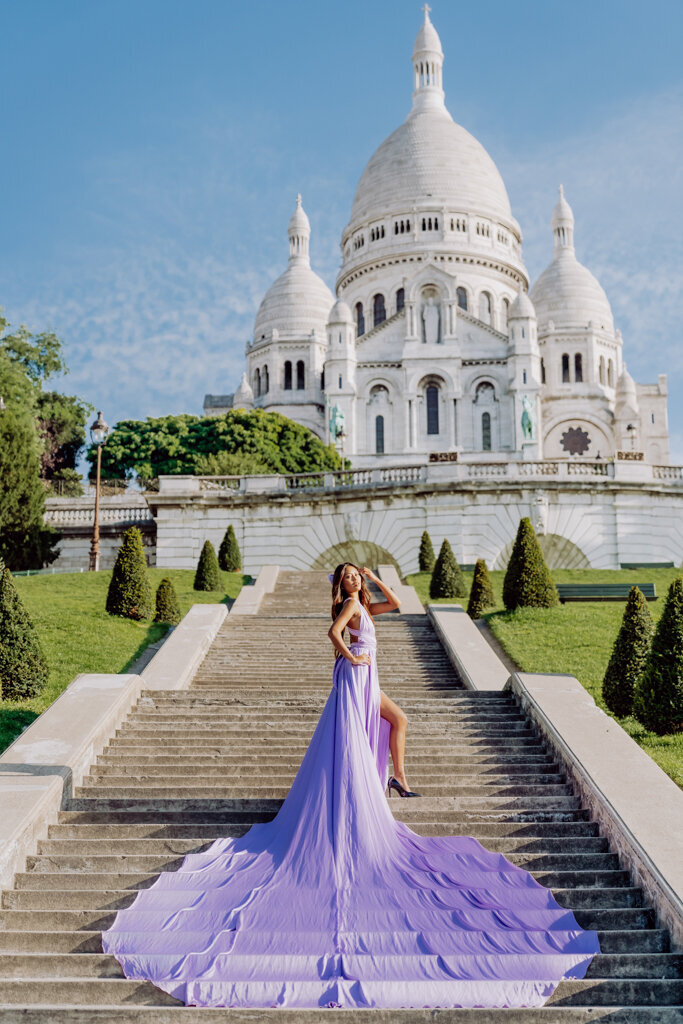 Sacré-Cœur Paris photoshoot location with a woman in a lavender flying dress on the stairs